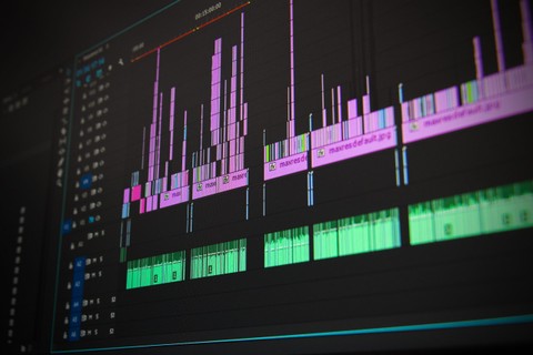 Snapshot of music mixing with audio and visual tracks.